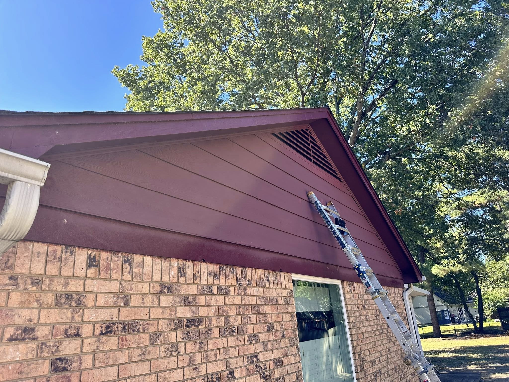 Exterior repaint and siding work
